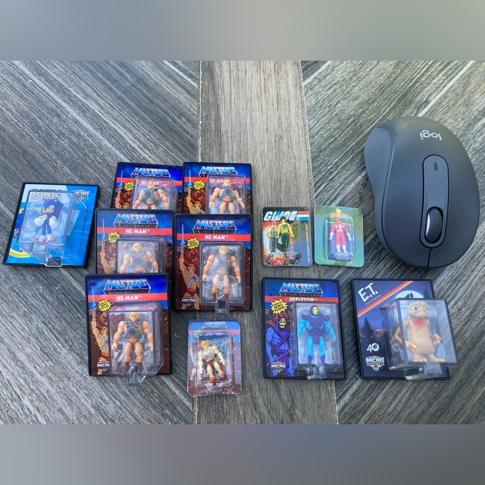 Miniature He-Man, Skeletor, E.T., Sonic, GI Joe and a power ranger.